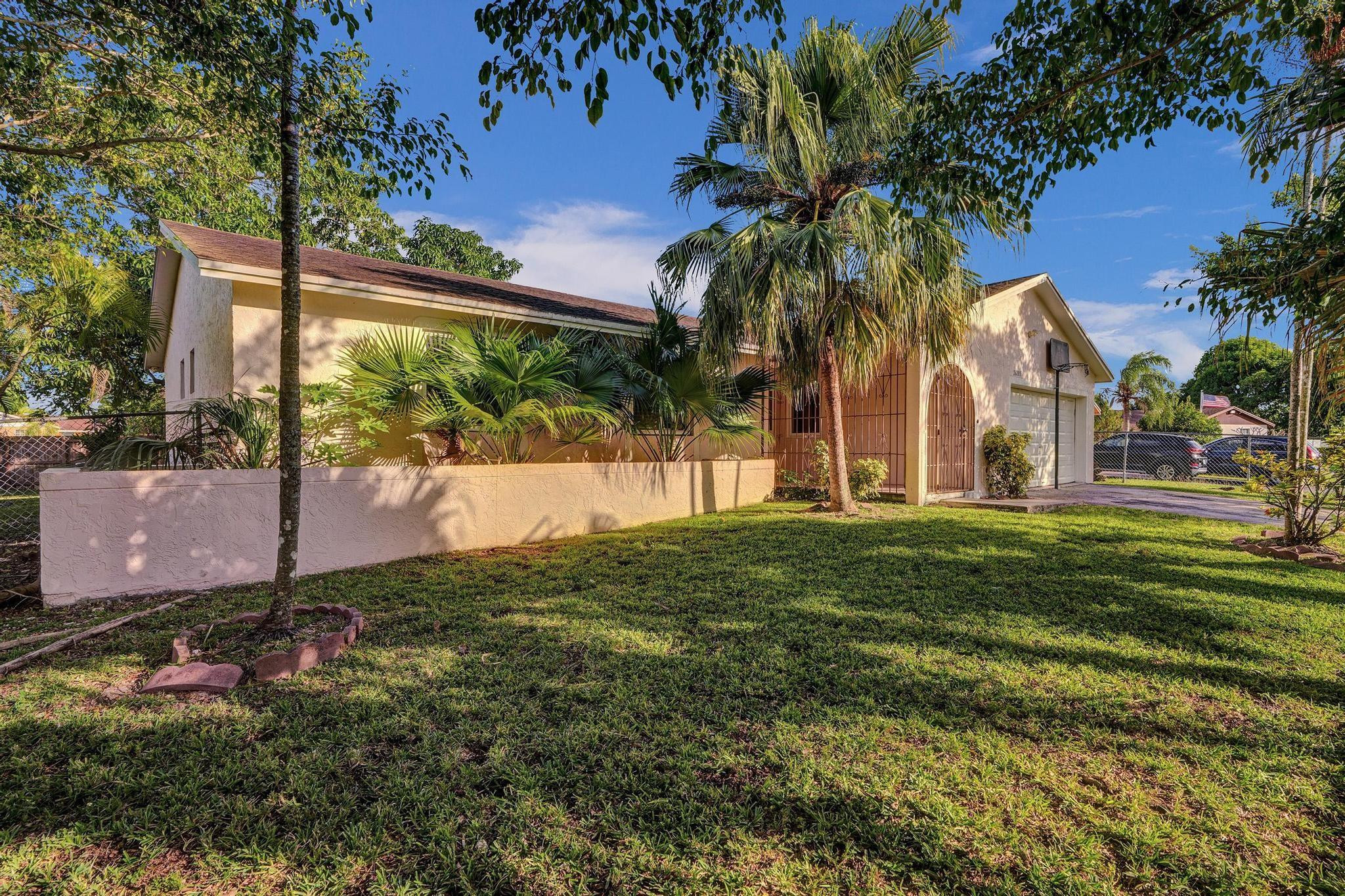 26205 Southwest 133rd Court Homestead, FL 33032 - Photo 5 of 45 a view of a backyard