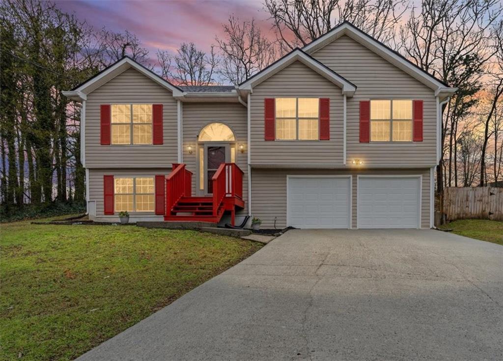 2242 Rocksram Court Buford, GA 30519 - Photo 2 of 52 a view of a house with a outdoor space
