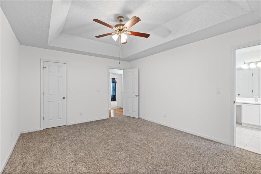 2242 Rocksram Court Buford, GA 30519 - Photo 28 of 52 a view of an empty room