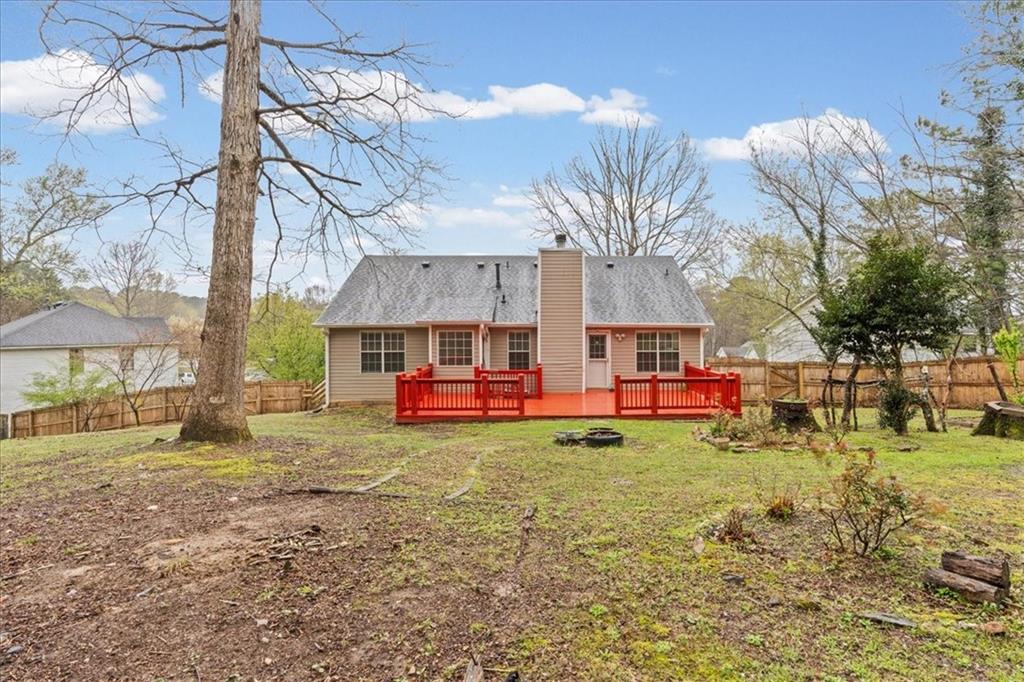 2242 Rocksram Court Buford, GA 30519 - Photo 44 of 52 a view of a house with backyard
