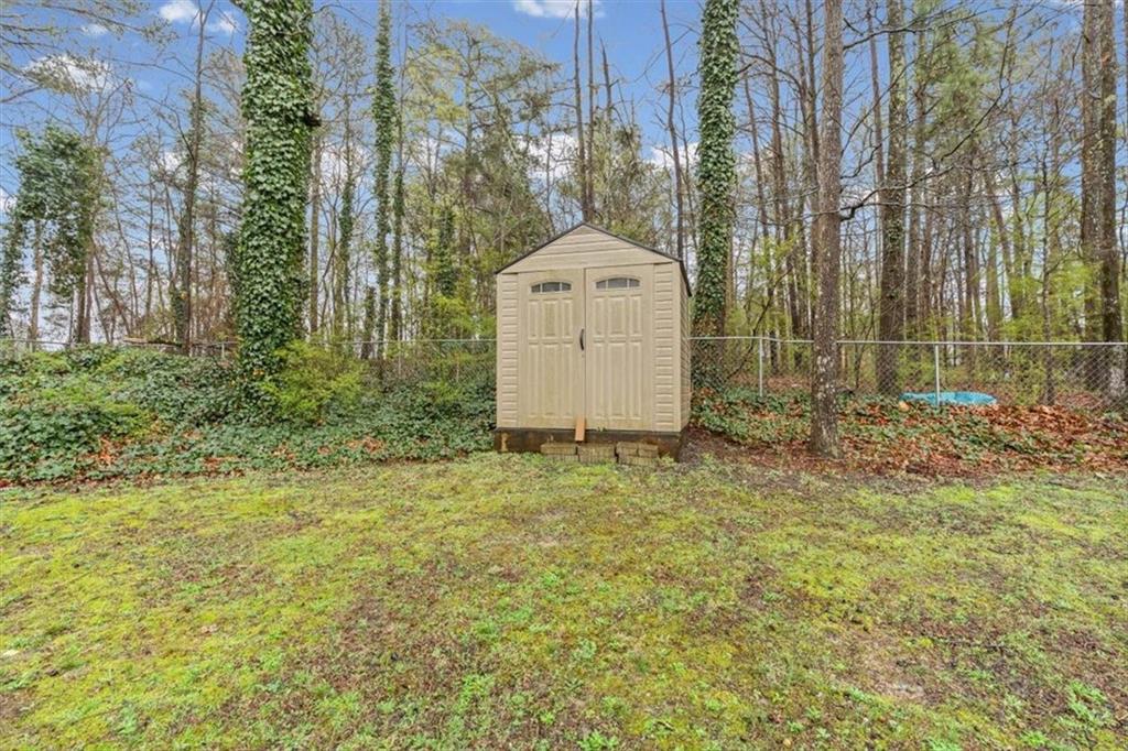 2242 Rocksram Court Buford, GA 30519 - Photo 49 of 52 a view of a backyard