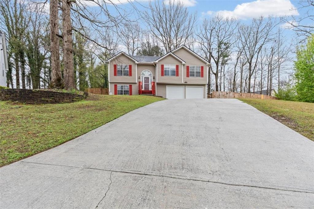 2242 Rocksram Court Buford, GA 30519 - Photo 6 of 52 a view of house with outdoor space
