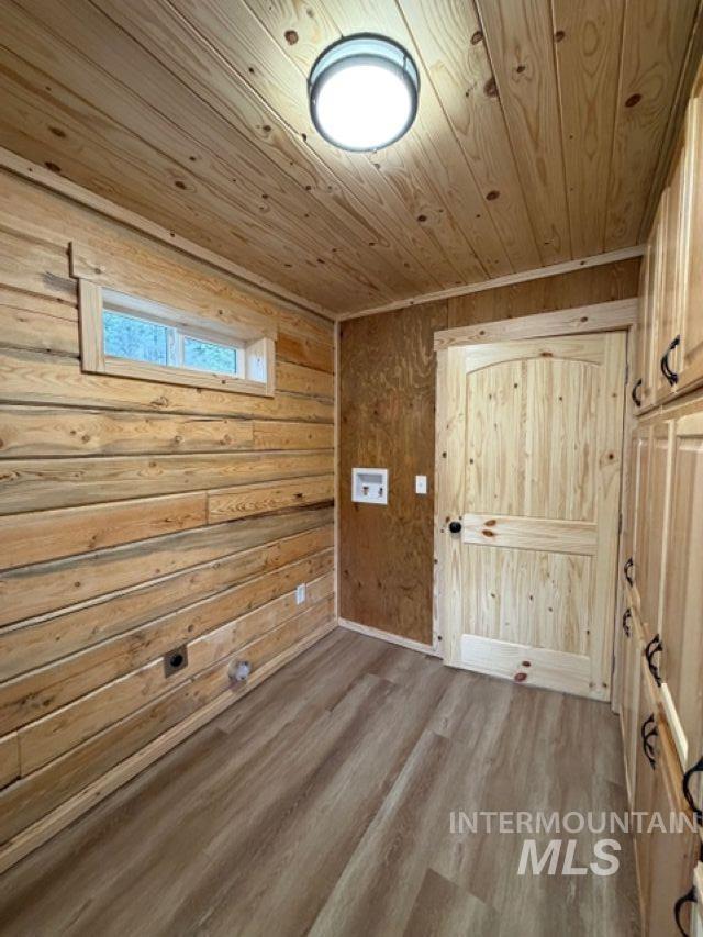 124 Windmill Lane Kooskia, ID 83539 - Photo 24 of 47 Foyer featuring wooden walls, wood finished floors, and wooden ceiling