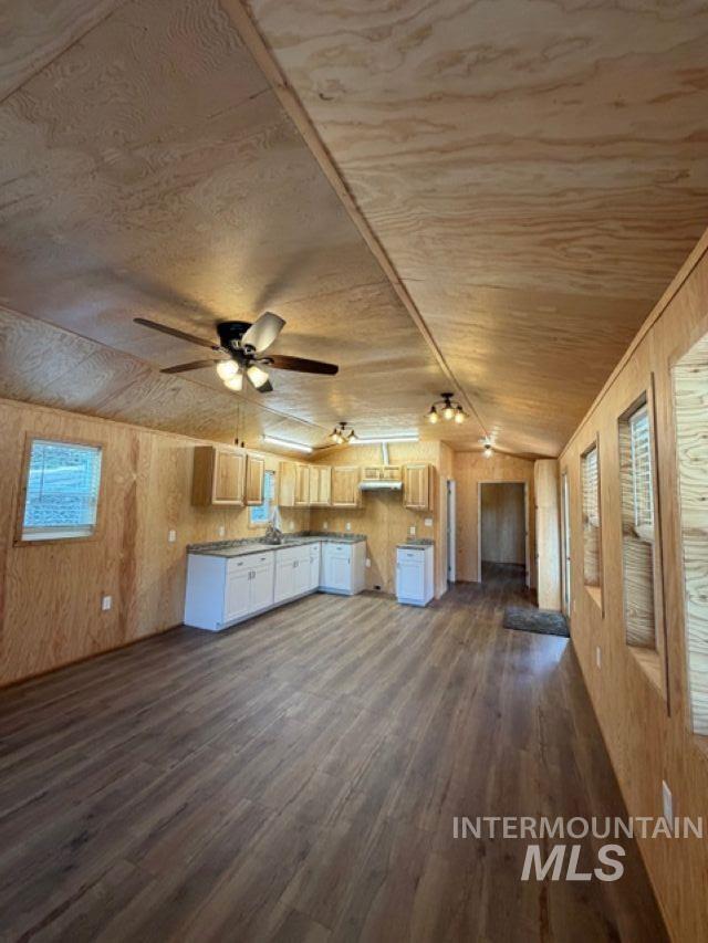 124 Windmill Lane Kooskia, ID 83539 - Photo 49 of 50 Kitchen with wood walls, dark wood-type flooring, a vaulted wood ceiling, and open floor plan