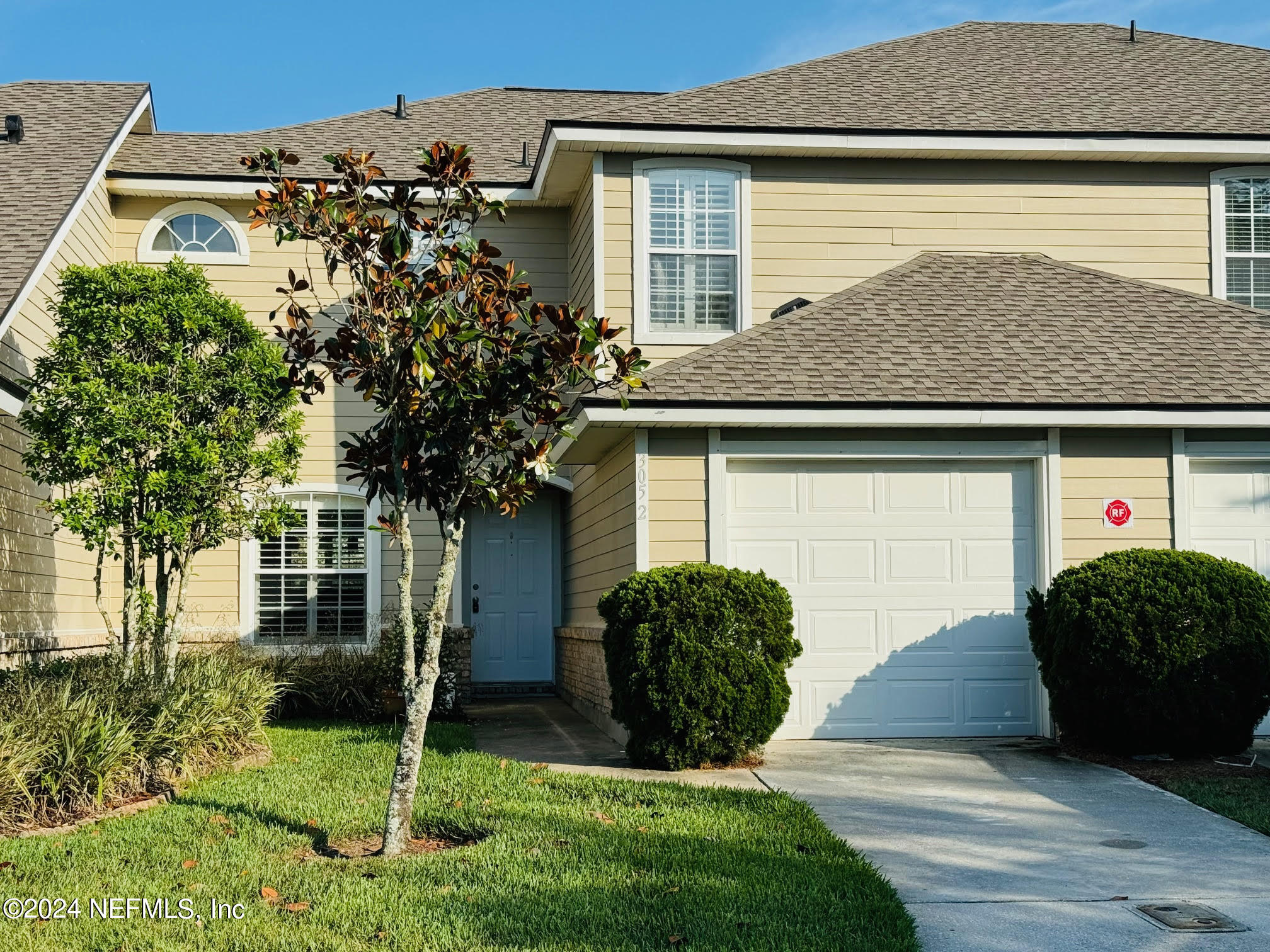 305 Blue Lake Road, Unit 2 St. Johns, FL 32259 - Photo 1 of 45 front view of a house with a yard