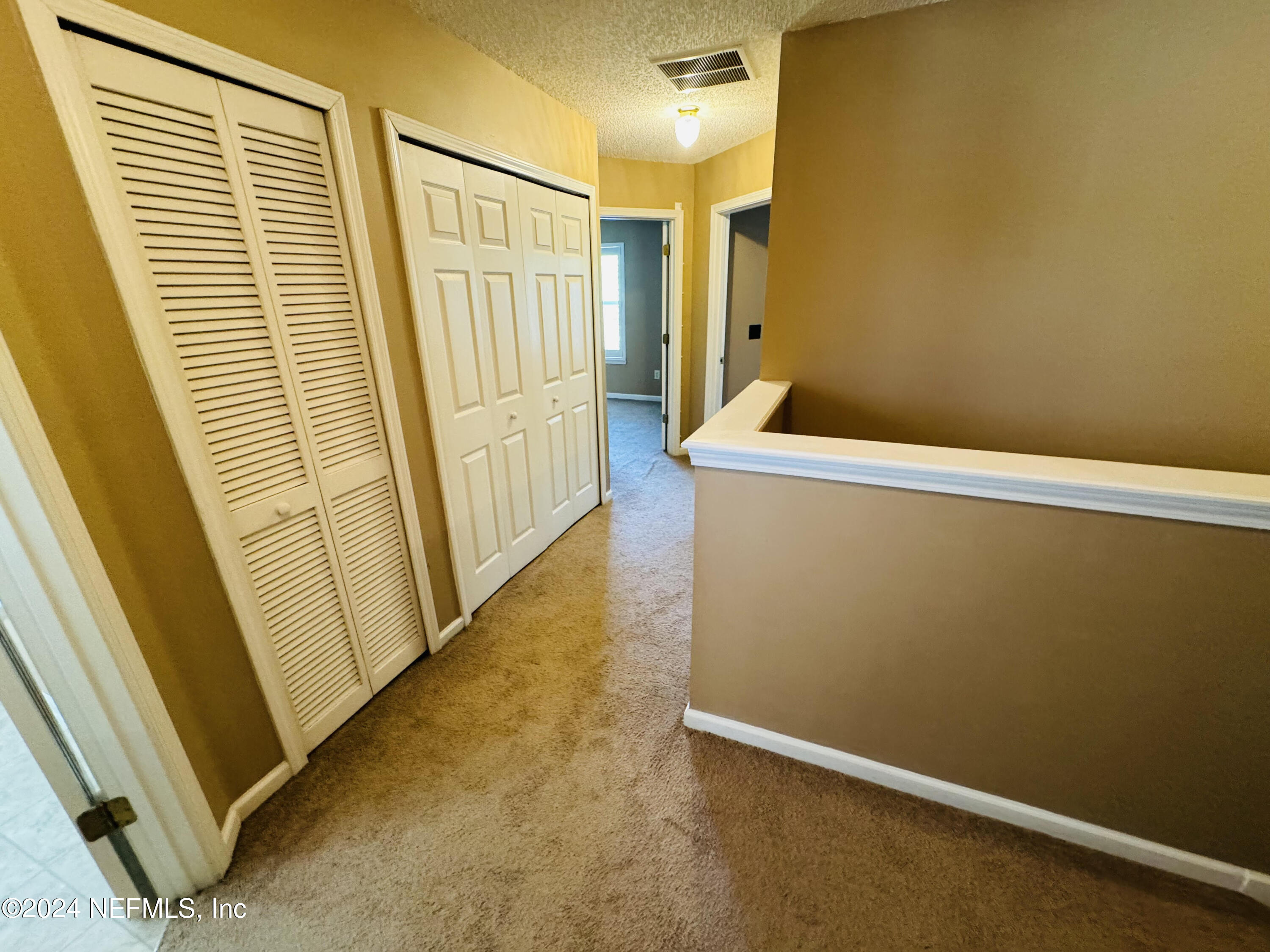 305 Blue Lake Road, Unit 2 St. Johns, FL 32259 - Photo 17 of 45 a view of a room with wooden door