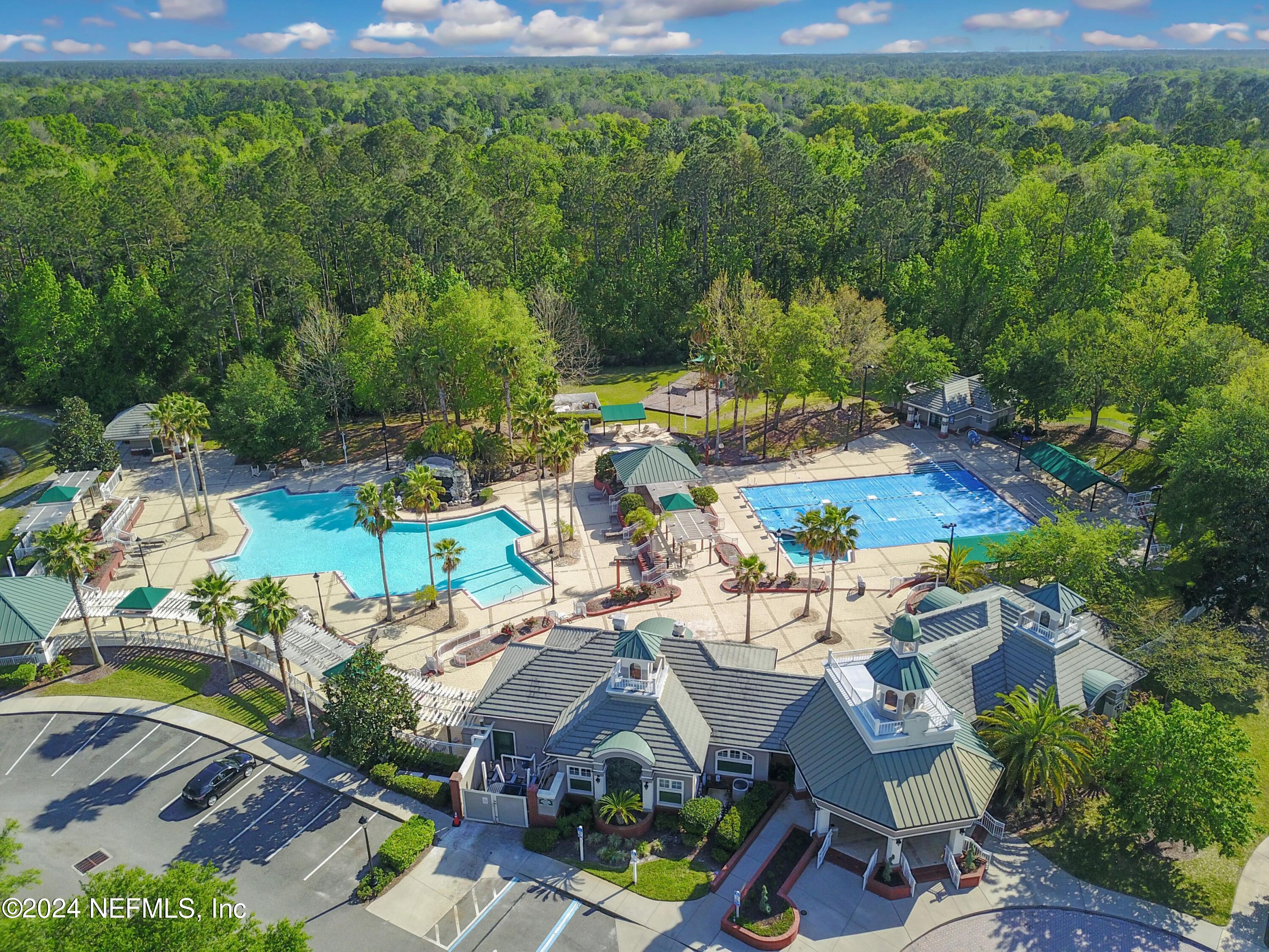 305 Blue Lake Road, Unit 2 St. Johns, FL 32259 - Photo 32 of 45 an aerial view of a house with garden space and street view