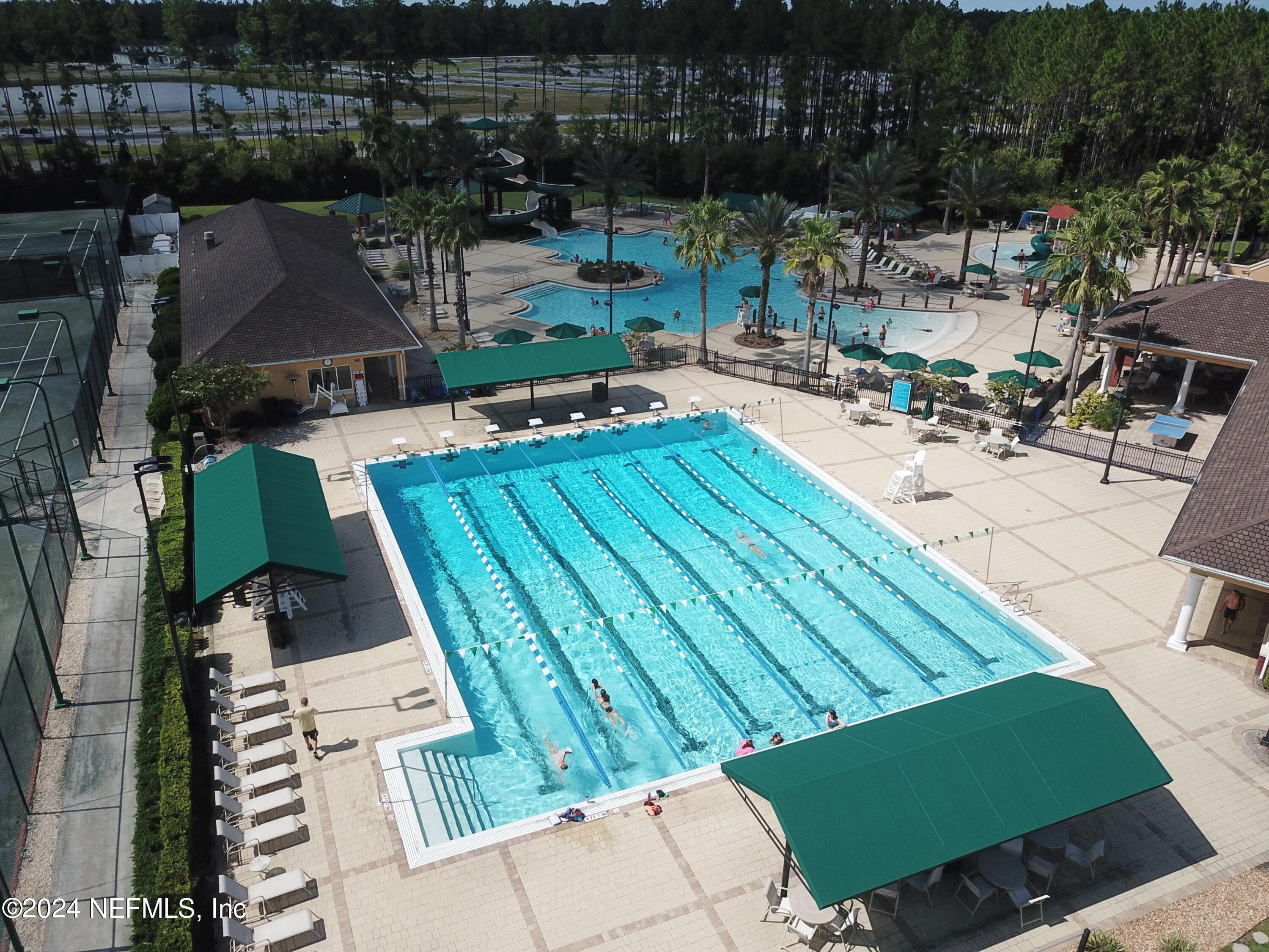 305 Blue Lake Road, Unit 2 St. Johns, FL 32259 - Photo 35 of 45 an aerial view of a house with a garden