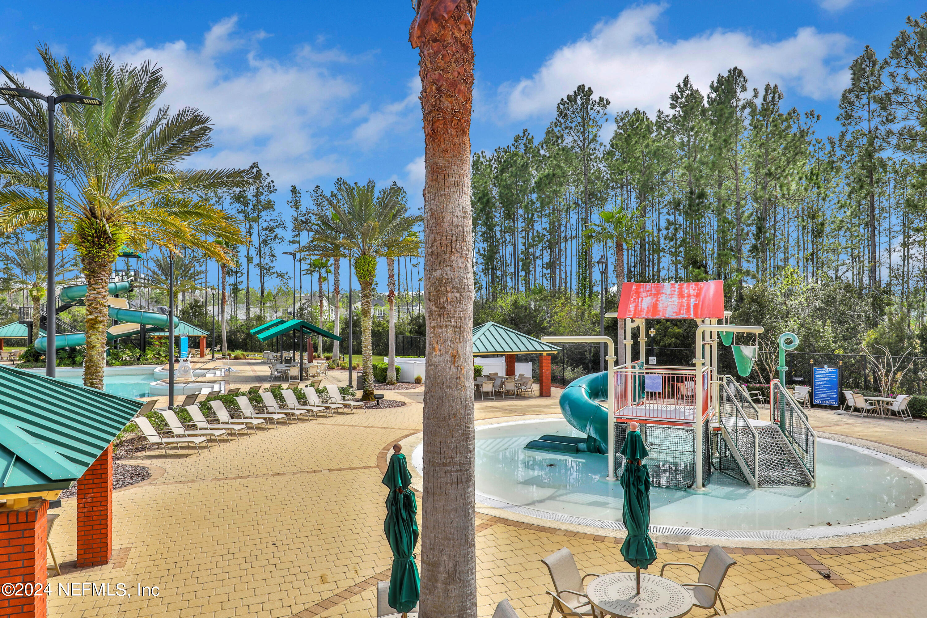 305 Blue Lake Road, Unit 2 St. Johns, FL 32259 - Photo 36 of 45 a view of swimming pool with outdoor seating