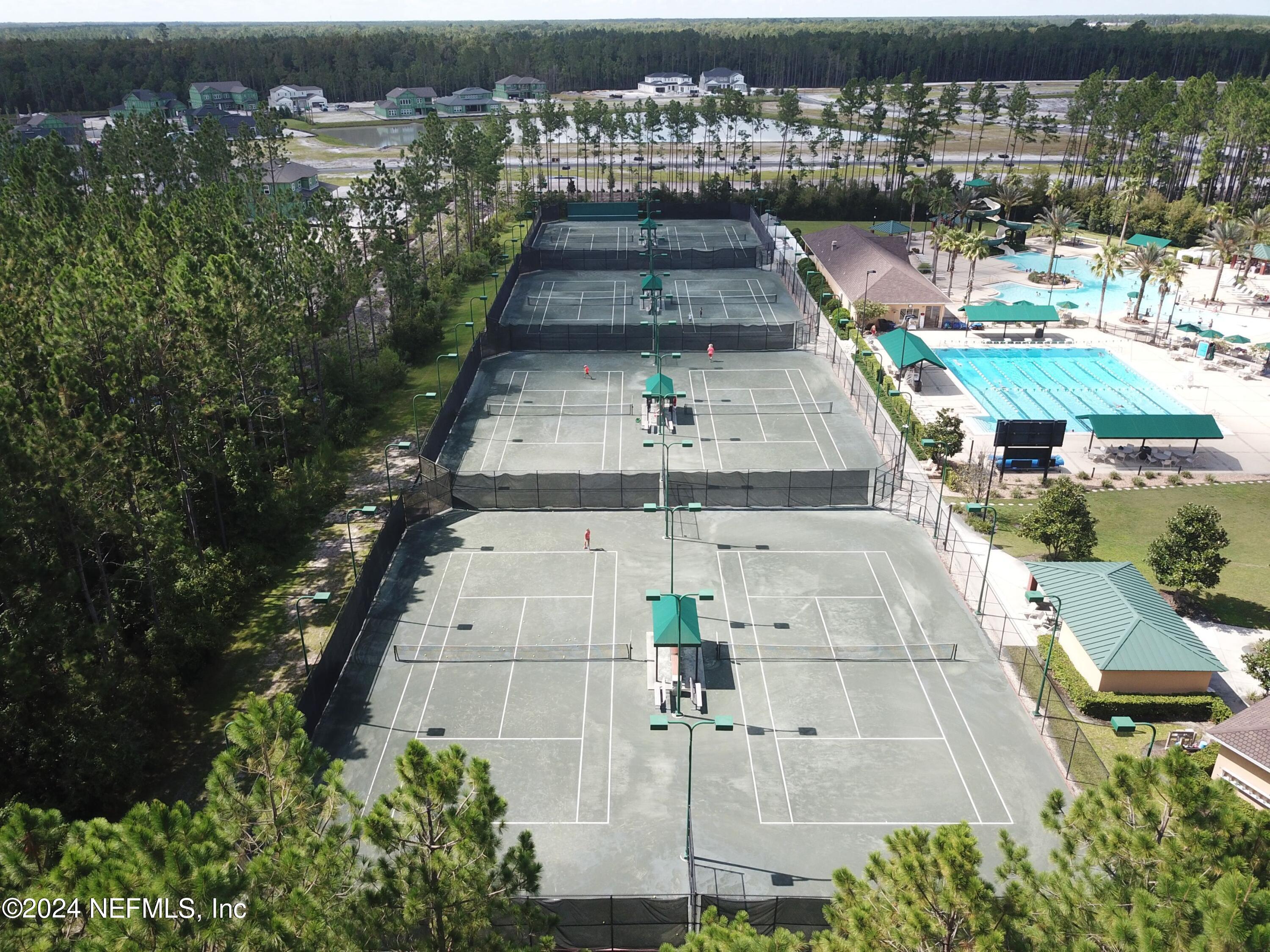 305 Blue Lake Road, Unit 2 St. Johns, FL 32259 - Photo 40 of 45 an aerial view of a large building and trees