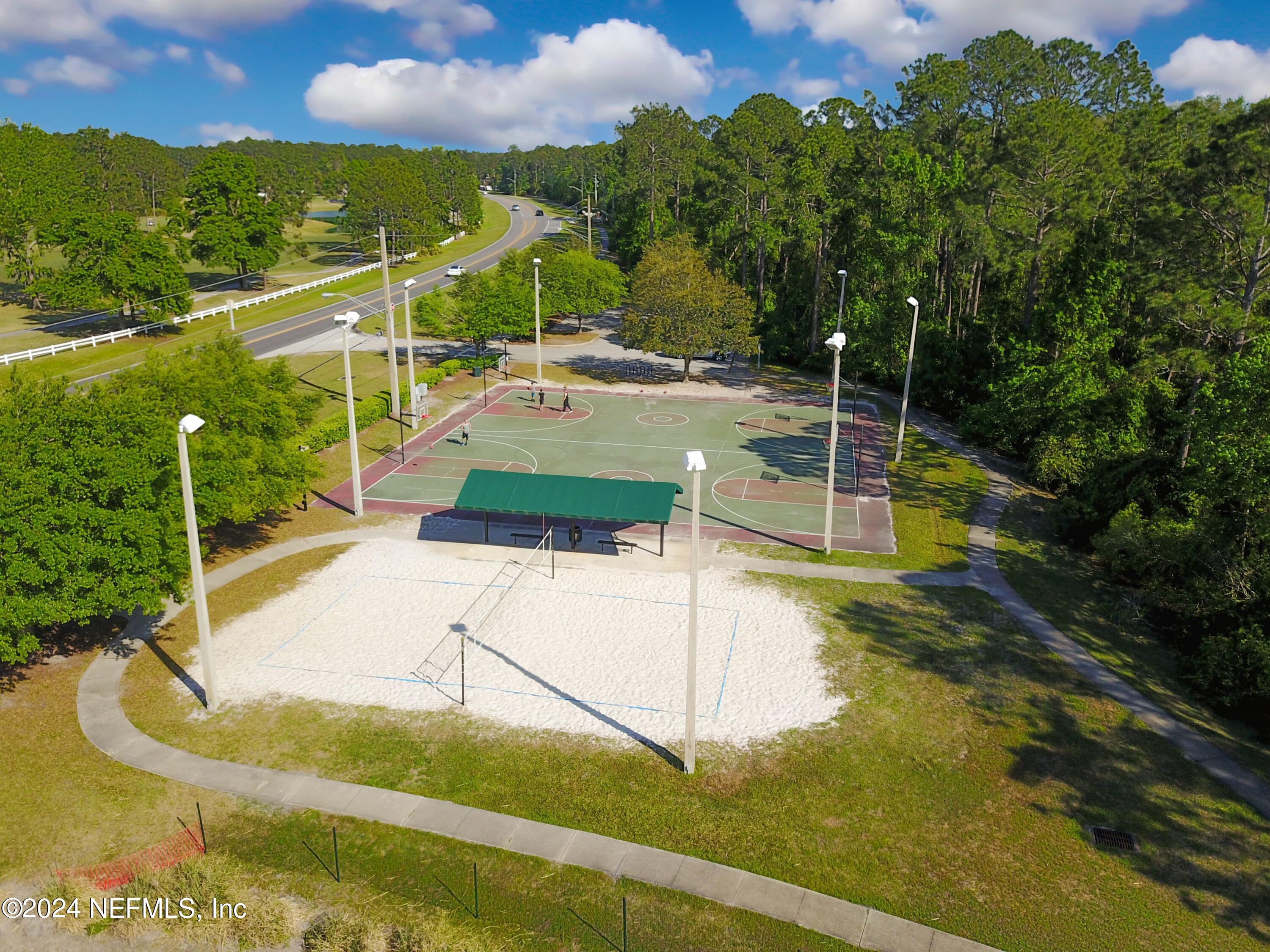 305 Blue Lake Road, Unit 2 St. Johns, FL 32259 - Photo 43 of 45 a view of a swimming pool with a patio