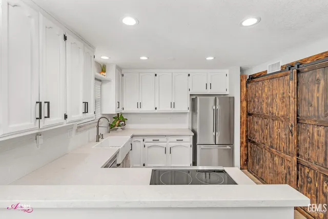 a bathroom with a sink and a window
