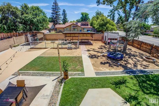 front view of a building with a garden