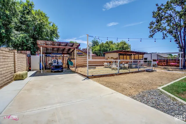 an aerial view of a house with outdoor space