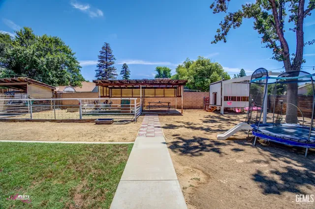 a view of a backyard with a garden