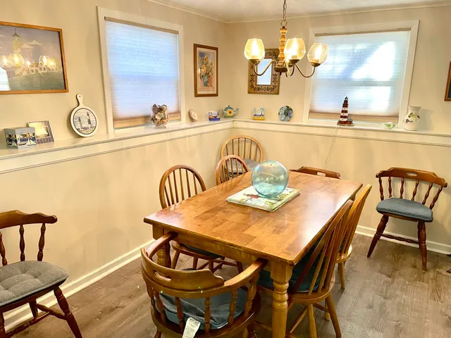 a view of a dining room and chairs