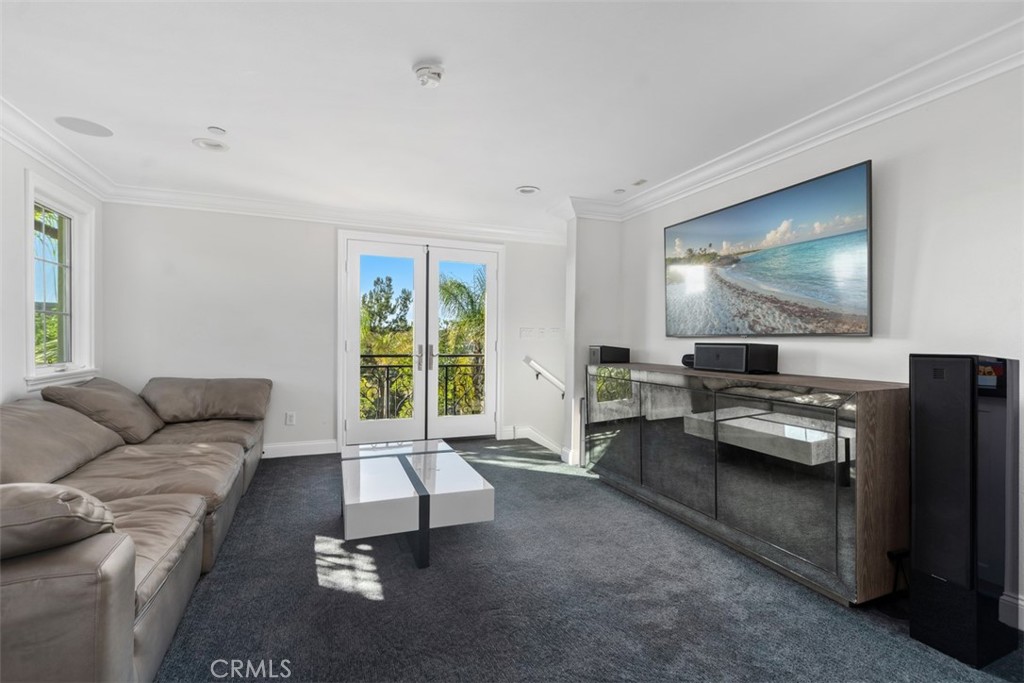 33 Basilica Place Ladera Ranch, CA 92694 - Photo 38 of 61 a living room with furniture and a flat screen tv