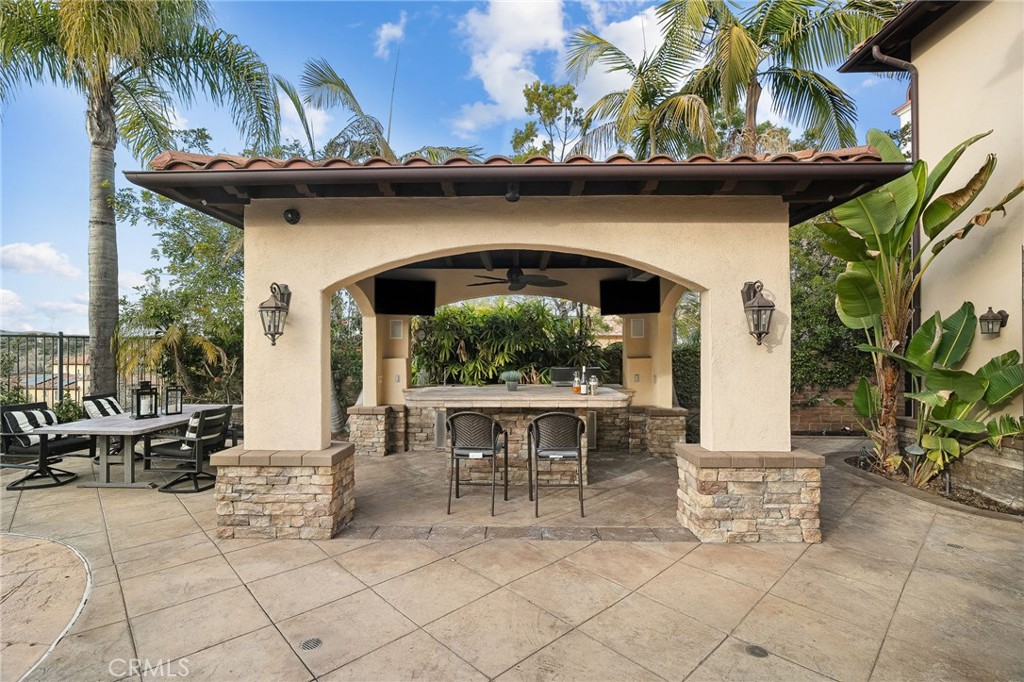33 Basilica Place Ladera Ranch, CA 92694 - Photo 53 of 61 a front view of a house with outdoor seating