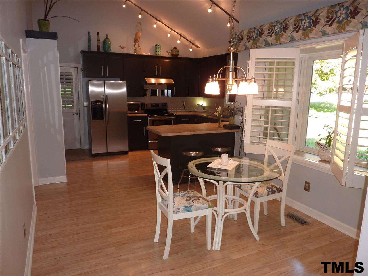1612 Brook Run Drive Raleigh, NC 27614 - Photo 3 of 15 Enjoy breakfast in this spacious area with great bay window that overlooks front yard.