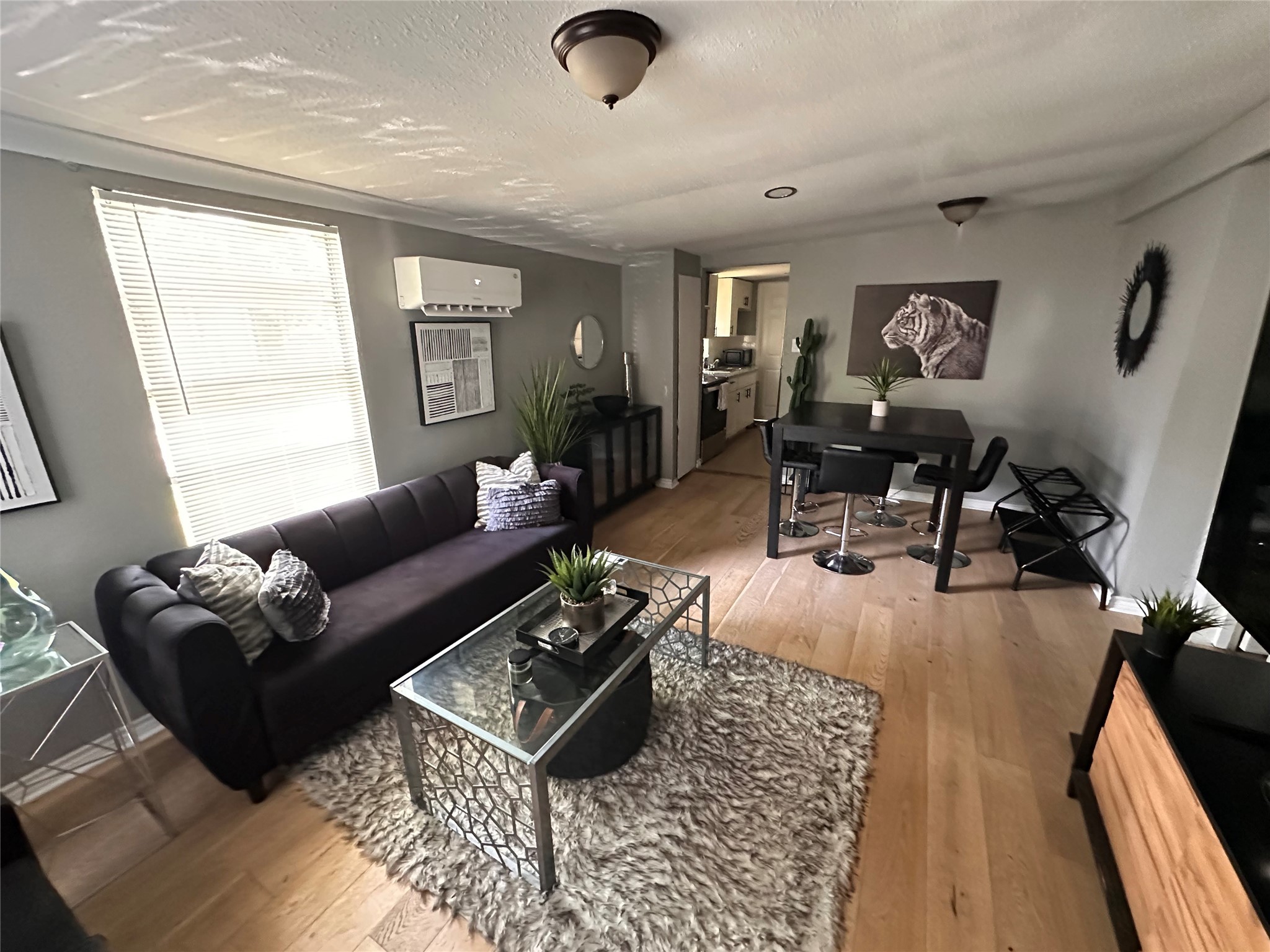 2131 Cromwell Street, Unit D Houston, TX 77093 - Photo 21 of 26 a living room with furniture rug and window