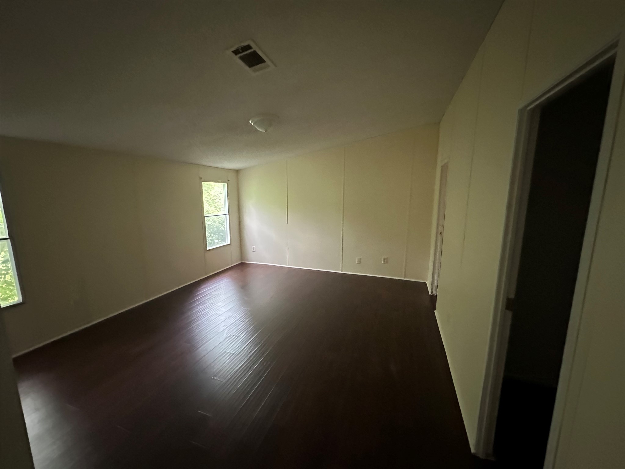 2131 Cromwell Street, Unit D Houston, TX 77093 - Photo 8 of 26 a view of room with window and hardwood floor