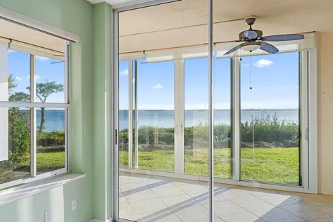 a view of a room with a large window
