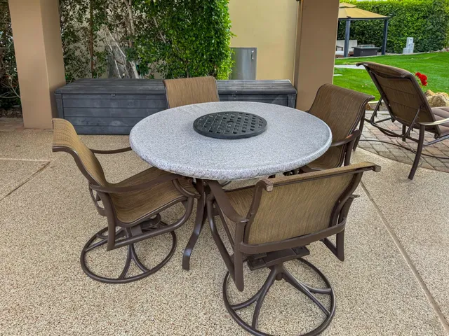 a outdoor dining space with furniture and garden