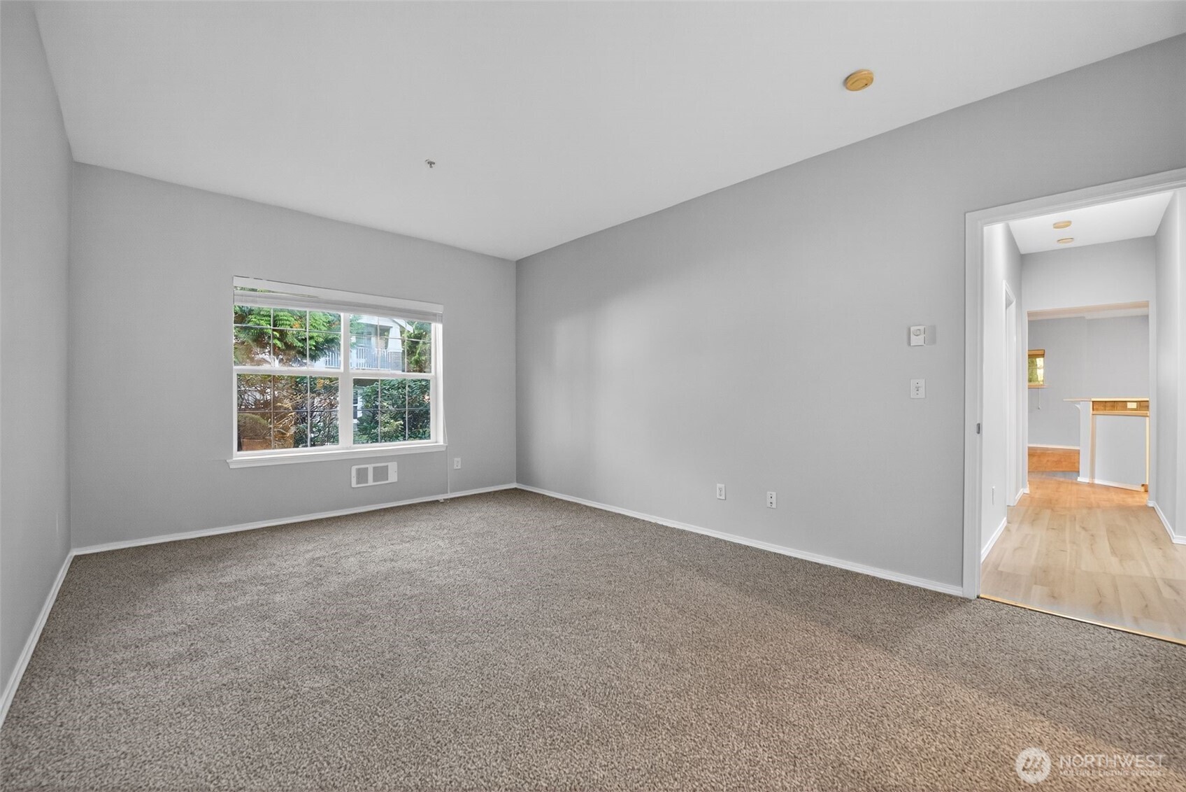 1680 Kennedy Place, Unit A4 DuPont, WA 98327 - Photo 15 of 24 an empty room with windows