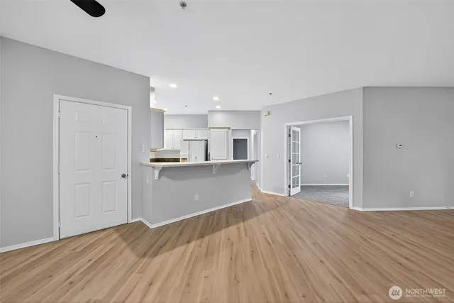 a view of kitchen with wooden floor