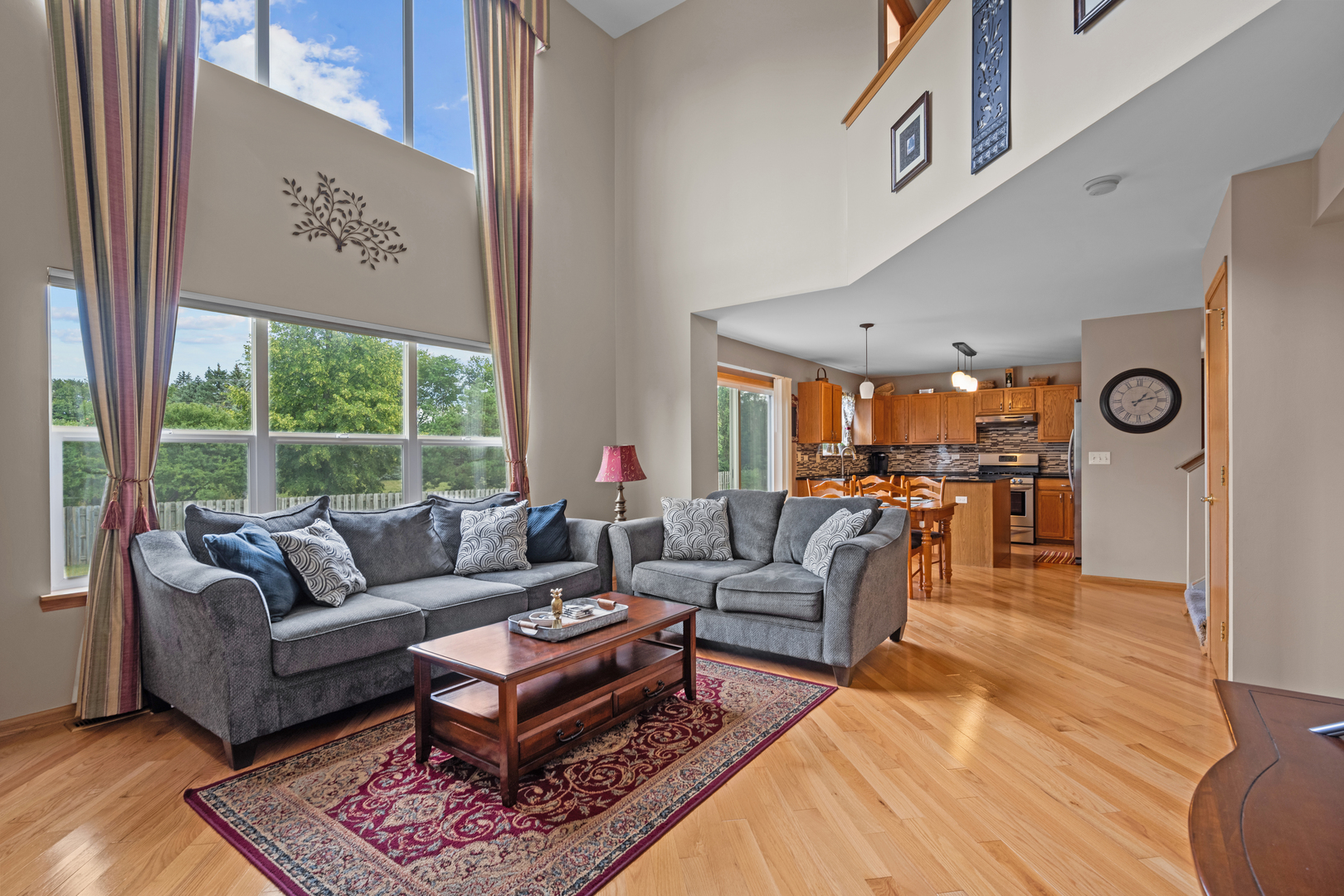 614 Wingpointe Drive Aurora, IL 60506 - Photo 13 of 31 a living room with furniture and a large window
