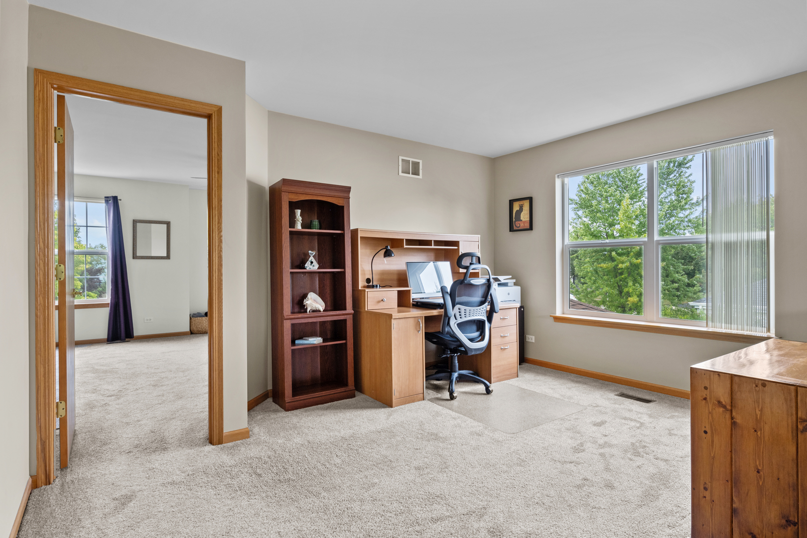 614 Wingpointe Drive Aurora, IL 60506 - Photo 16 of 31 a view of a livingroom with furniture and a window