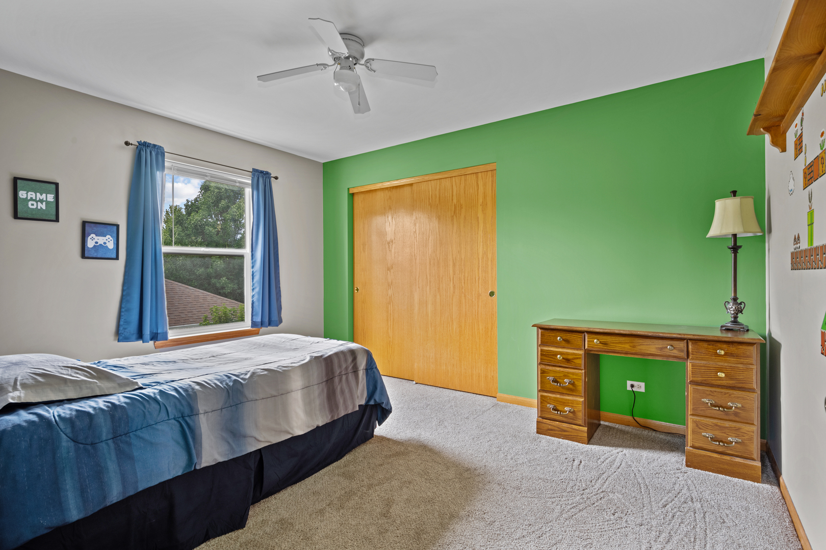 614 Wingpointe Drive Aurora, IL 60506 - Photo 24 of 31 a bedroom with a bed and a dresser