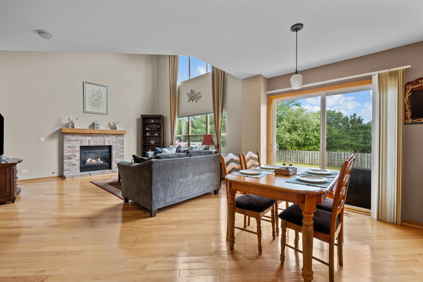 614 Wingpointe Drive Aurora, IL 60506 - Photo 8 of 31 a view of a livingroom with furniture window and wooden floor