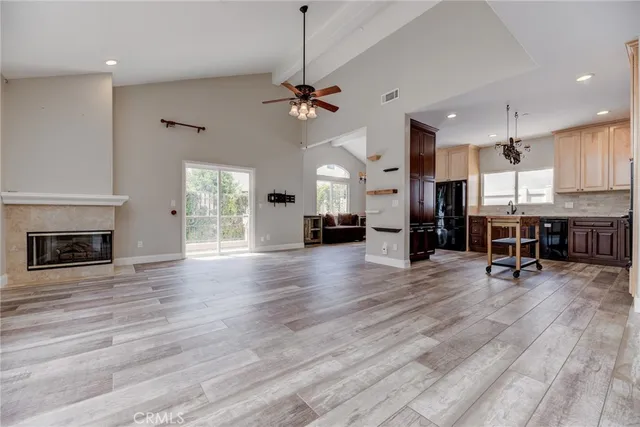 a view of a livingroom with furniture and a fireplace