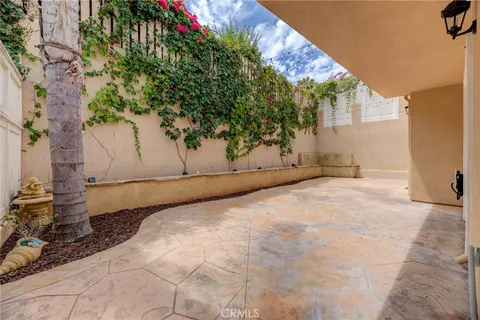 a view of a backyard of the house