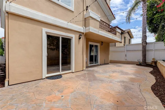 a view of a house with a snow in the yard