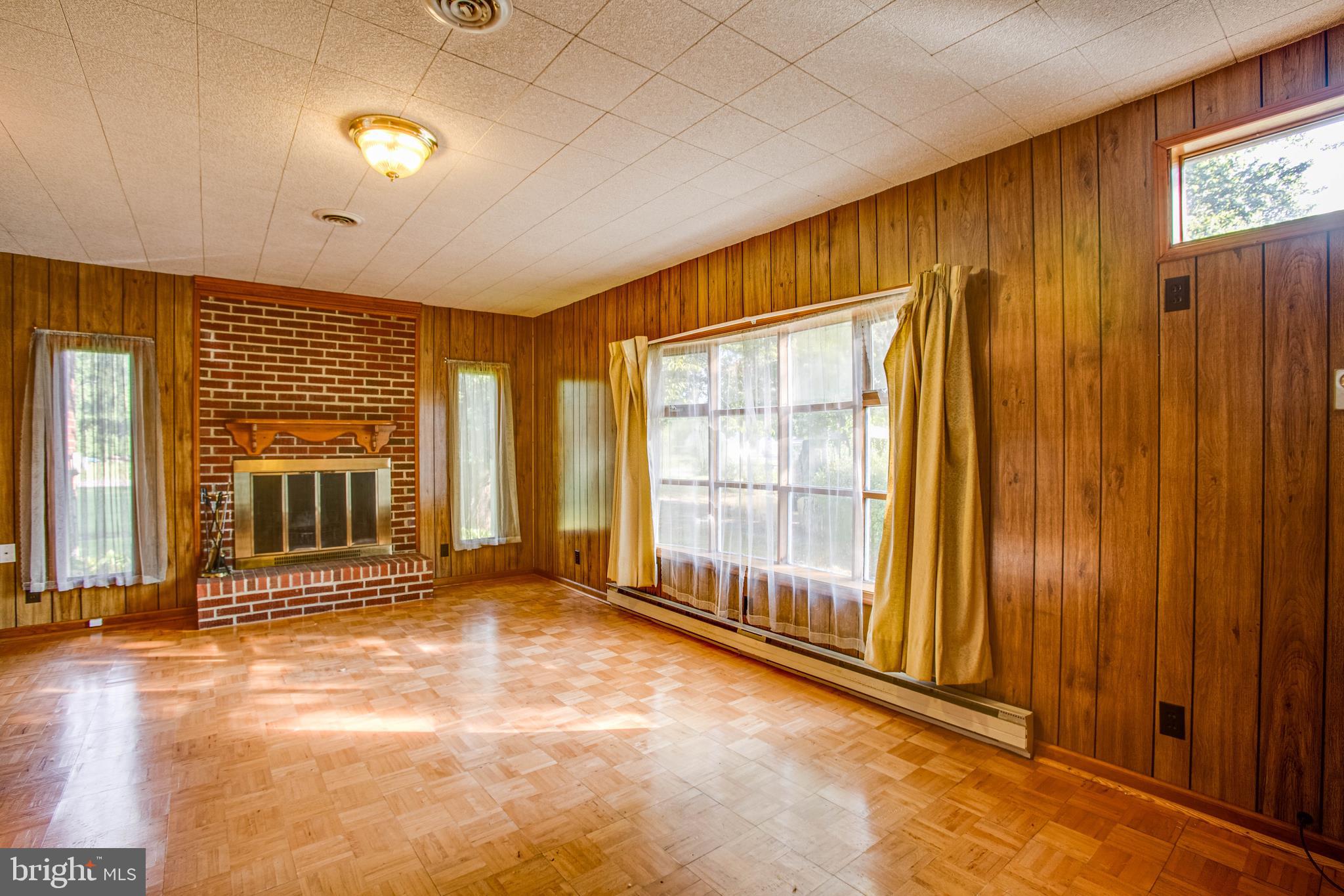11358 Ridge Road King George, VA 22485 - Photo 15 of 31 Family room with wood burning fireplace