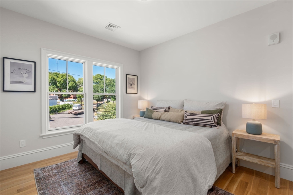 69 Williams Street, Unit 3 Boston, MA 02130 - Photo 13 of 22 a bedroom with a bed and a window