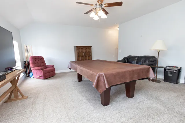a view of entrance gate of the house and trees