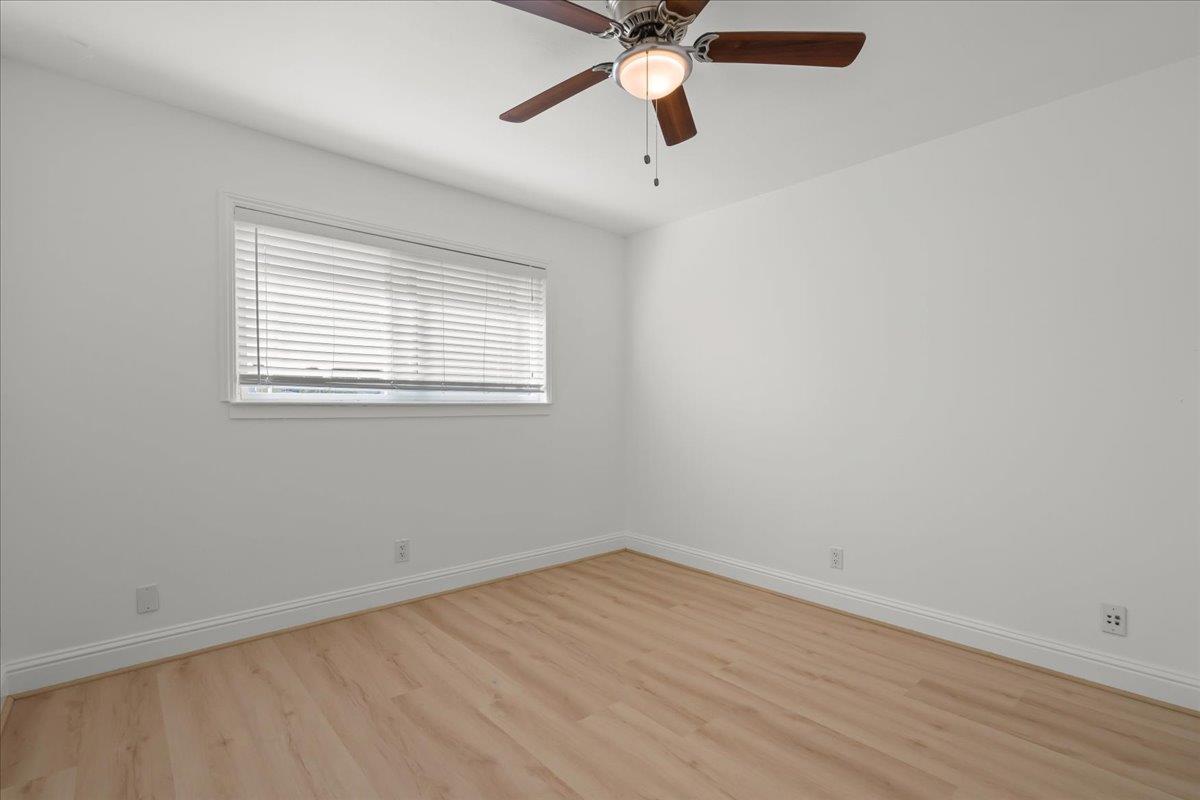 1610 Soto Street Seaside, CA 93955 - Photo 11 of 20 an empty room with a window and a fan