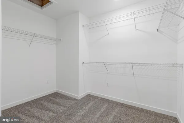 a bathroom with a sink double vanity and a mirror