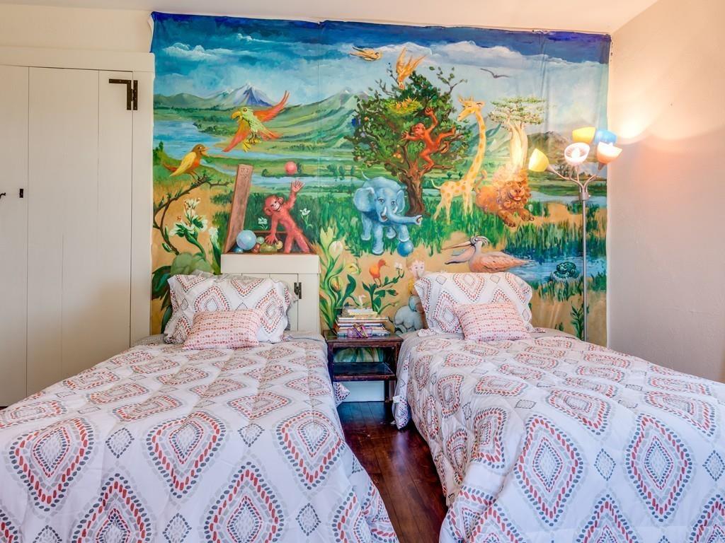 5 Way Road Gloucester, MA 01930 - Photo 20 of 24 a bedroom with a bed and a painting on the wall