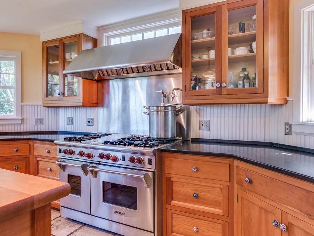 5 Way Road Gloucester, MA 01930 - Photo 7 of 24 a kitchen with stainless steel appliances granite countertop a stove and a sink