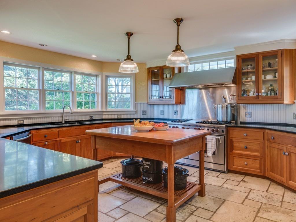 5 Way Road Gloucester, MA 01930 - Photo 8 of 24 a kitchen that has a sink a stove and a table in it