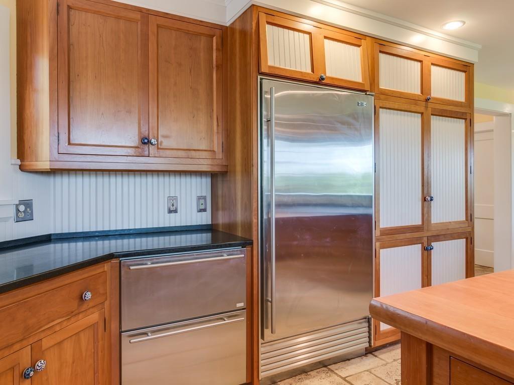5 Way Road Gloucester, MA 01930 - Photo 9 of 24 a kitchen with granite countertop a refrigerator and cabinets
