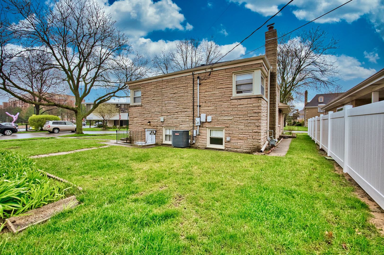 5200 Madison Street Skokie, IL 60077 - Photo 14 of 53 a view of a house with a yard