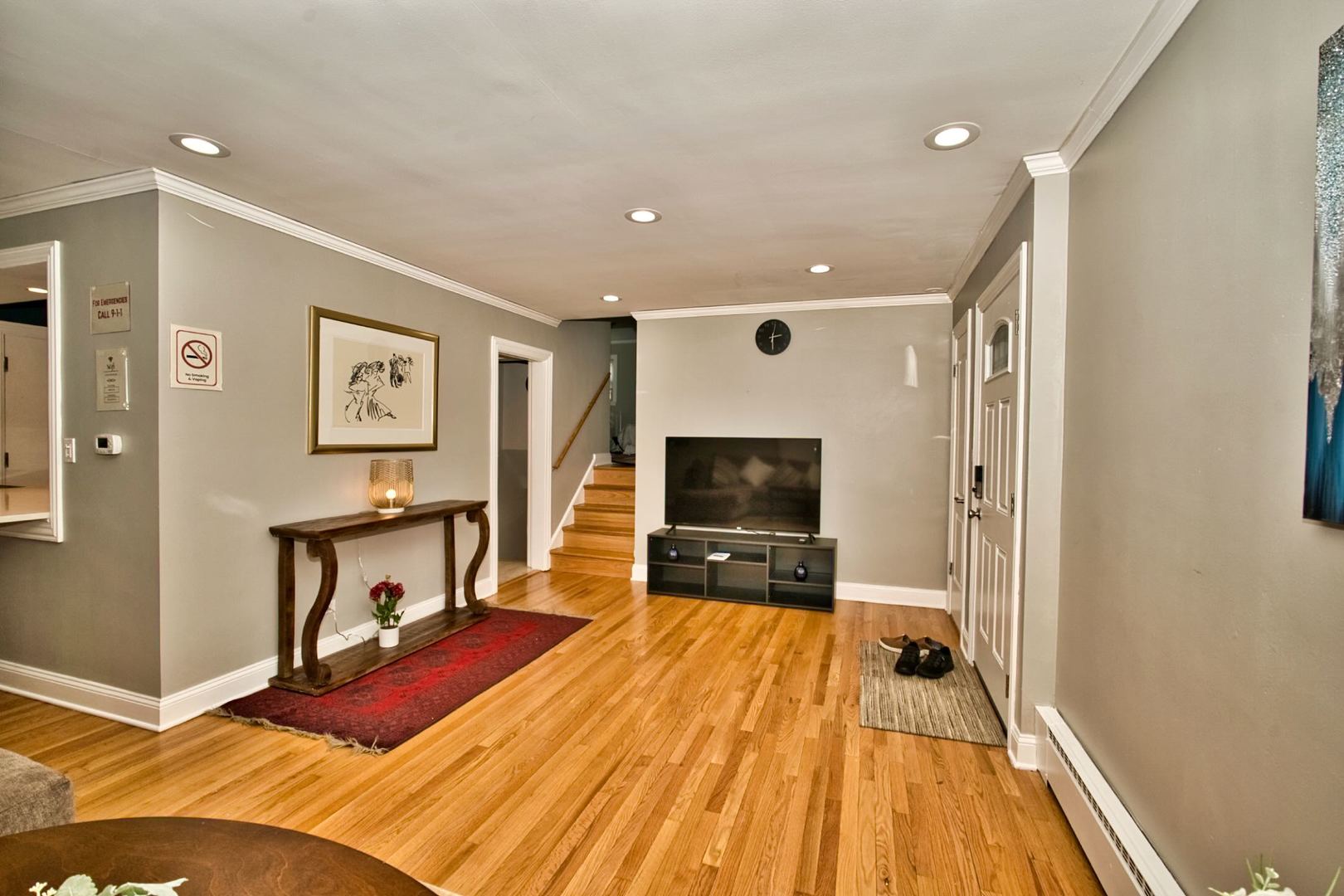 5200 Madison Street Skokie, IL 60077 - Photo 16 of 53 a view of a livingroom with furniture and a flat screen tv