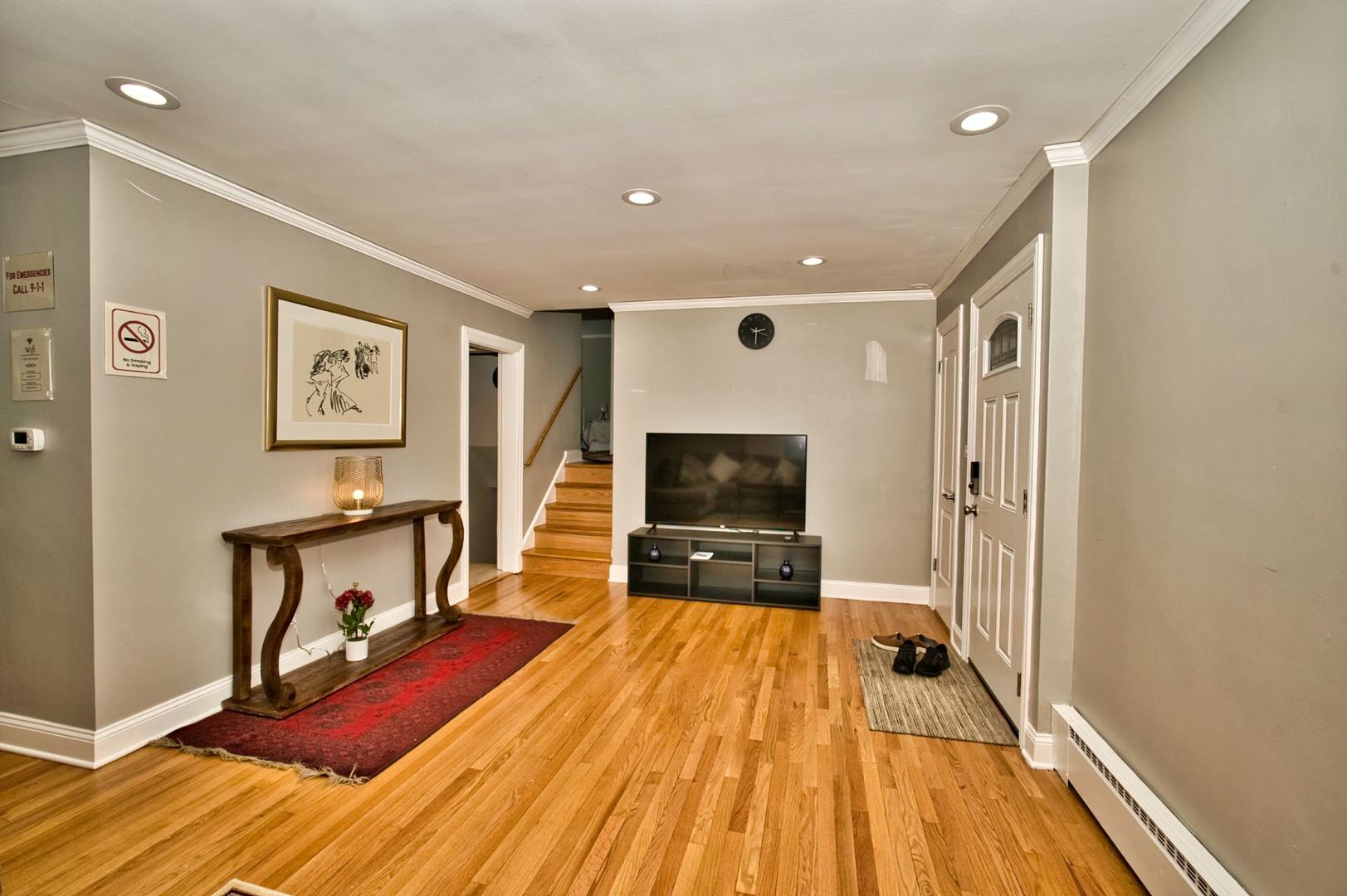 5200 Madison Street Skokie, IL 60077 - Photo 18 of 53 a living room with furniture and a flat screen tv