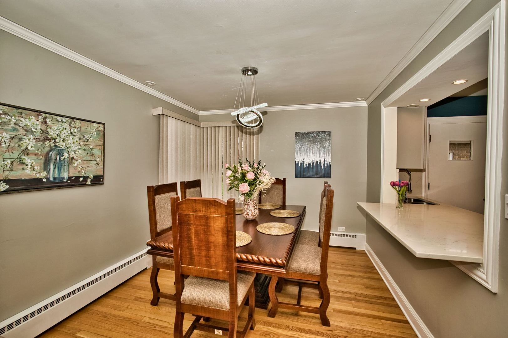 5200 Madison Street Skokie, IL 60077 - Photo 21 of 53 a dining room with furniture and wooden floor