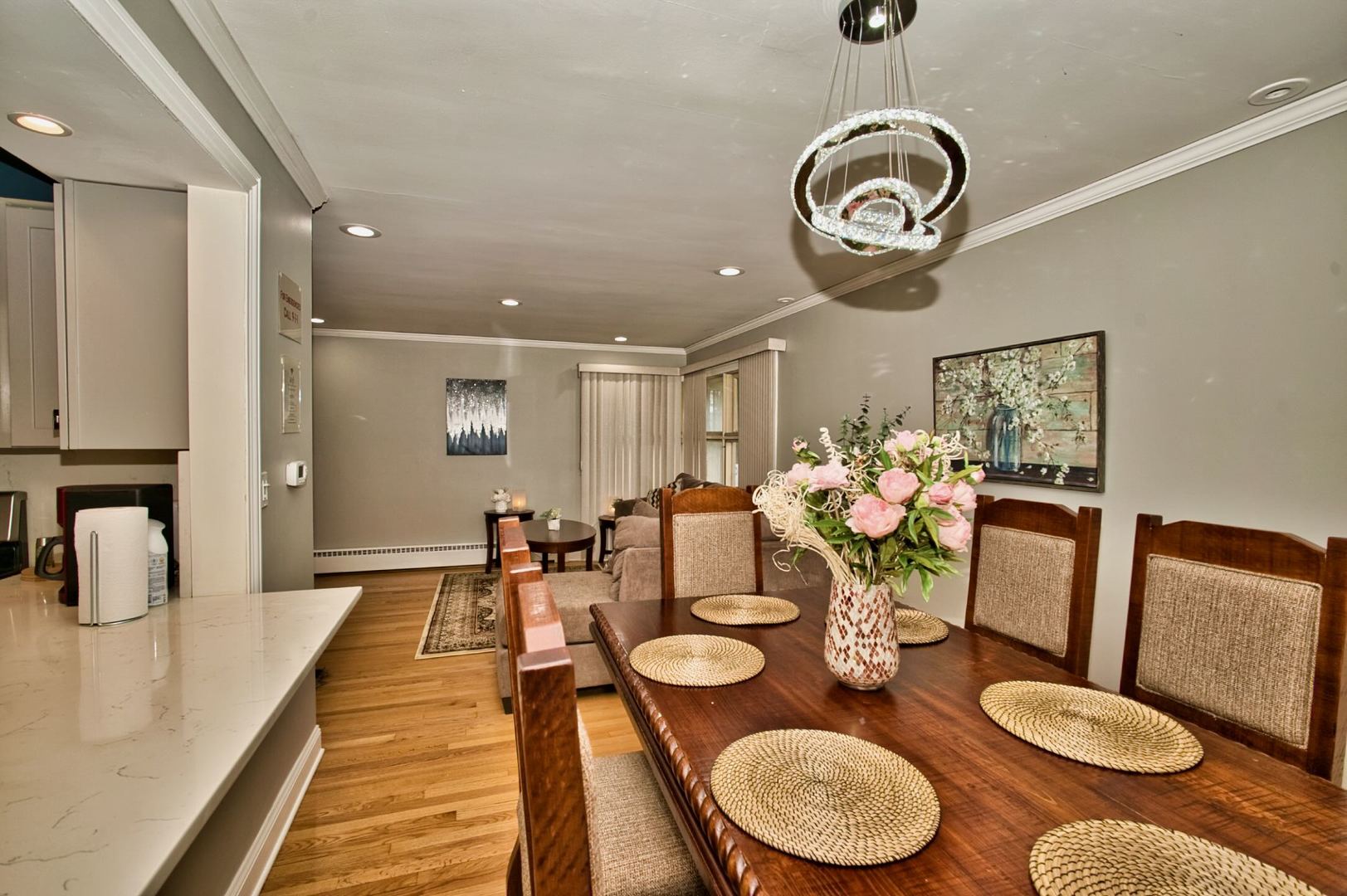 5200 Madison Street Skokie, IL 60077 - Photo 25 of 53 a dining room with furniture a rug and wooden floor